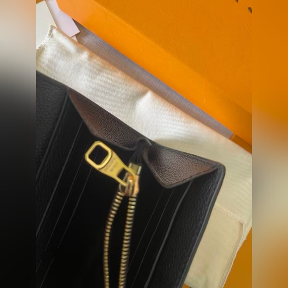 LOUIS VUITTON Monogram Empreinte Leather Sarah Wallet - Picture 9 of 11